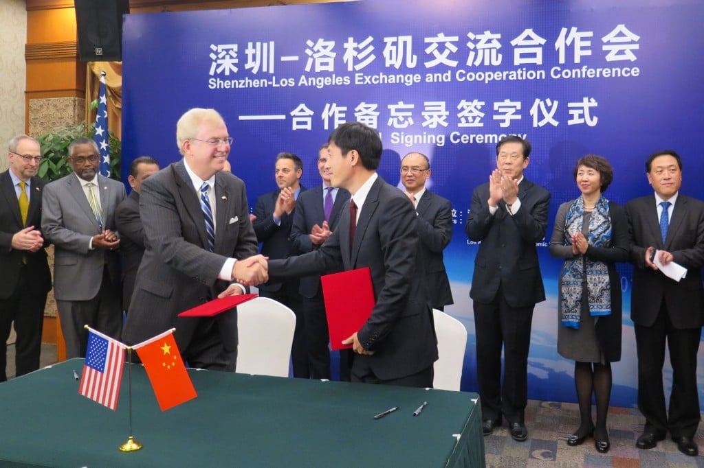 LAEDC CEO Bill Allen and CCPIT Shenzhen President Yongxin Tao shake hands after signing historic MOU for bilateral cooperation on trade and investment between the regions. Nov 18, 2014